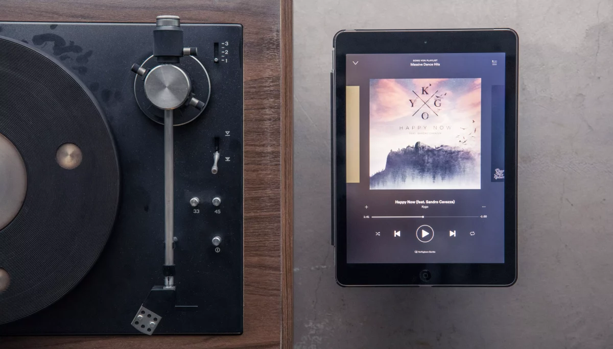 A record player is an example of an analogue interface and a tablet is a digital screen interface