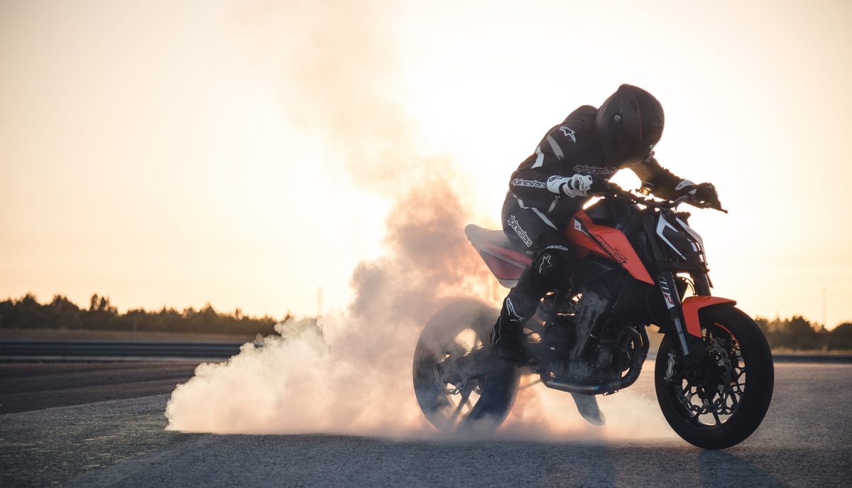 Rider doing a burnout on KTM 790 Duke video shoot and photo shoot