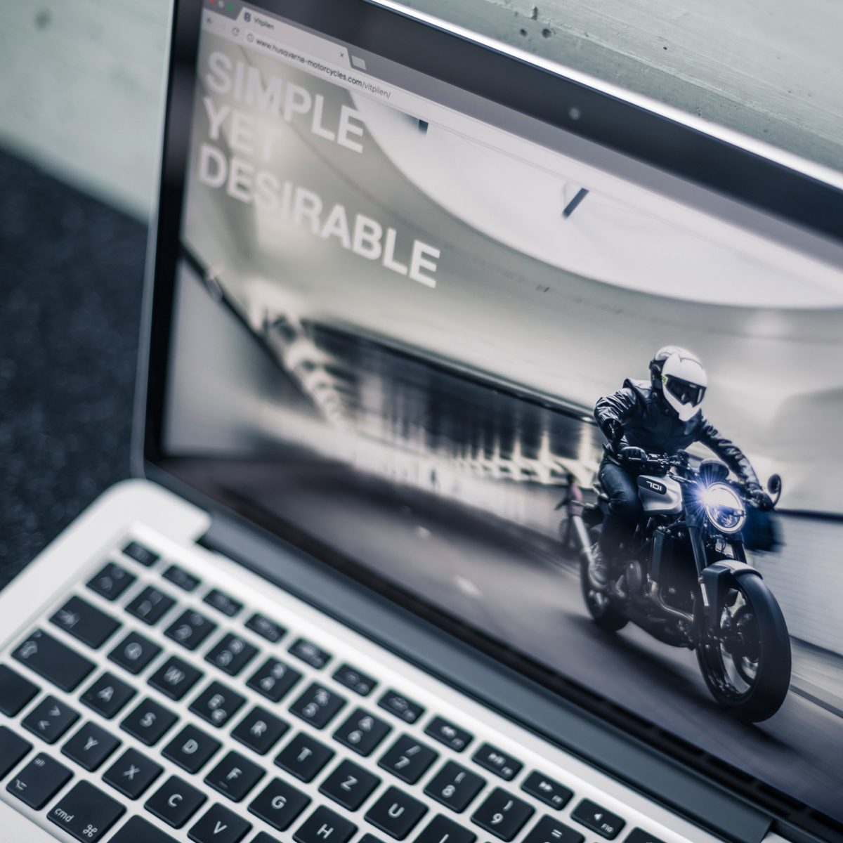 Husqvarna Motorcycles website on a laptop