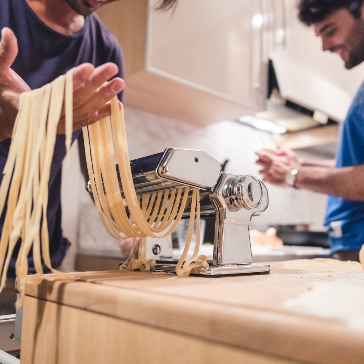 KISKA product management consultant making fresh pasta with apparel designer