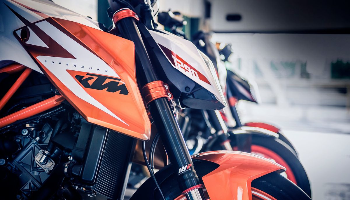 Side view of KTM 1290 Super Duke R and other KTM motorcycles