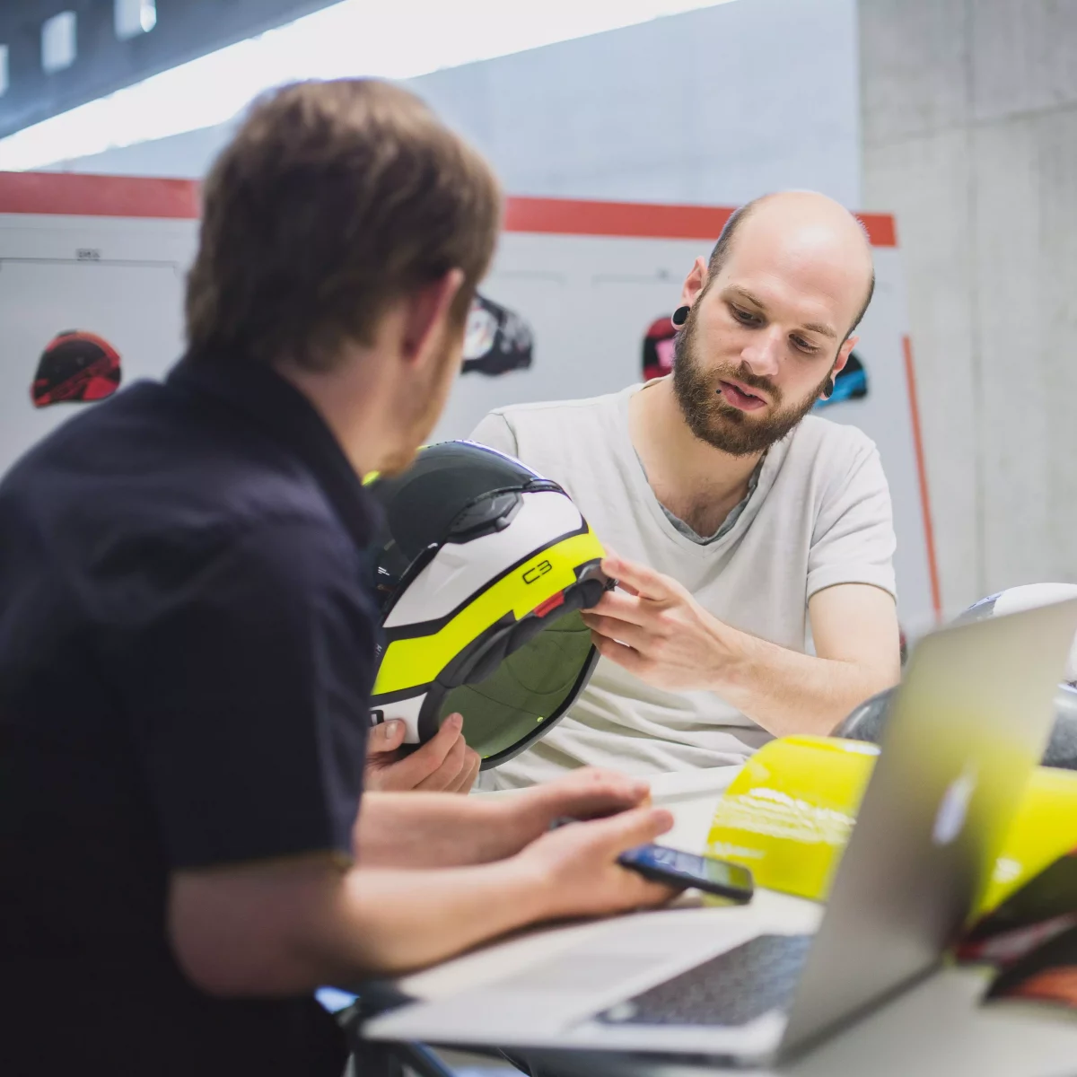 KISKA designers reviewing the colour, trim and graphics of the Schuberth C3 helmet